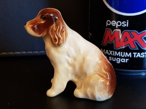 Beswick seated spaniel - -,